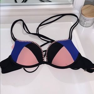 pink black and blue cupped bathing suit top